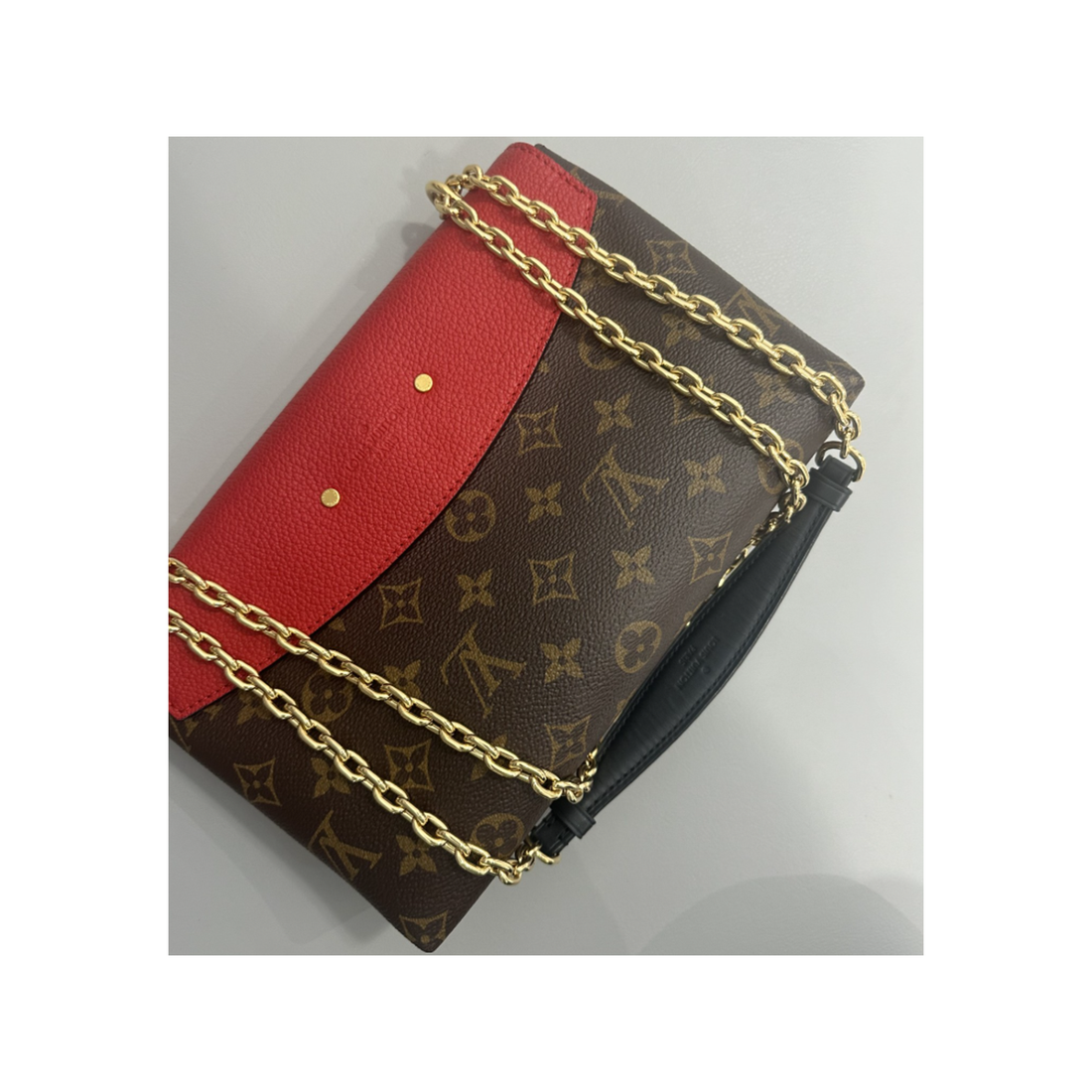 LOUIS VUITTTON SAINT PLACIDE MONOGRAM AND RED BAG